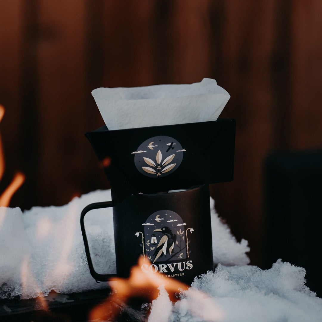 Custom printed MiiR Pourigami portable coffee brewer with Charlie Wagers artwork for Corvus Coffee Roasters.